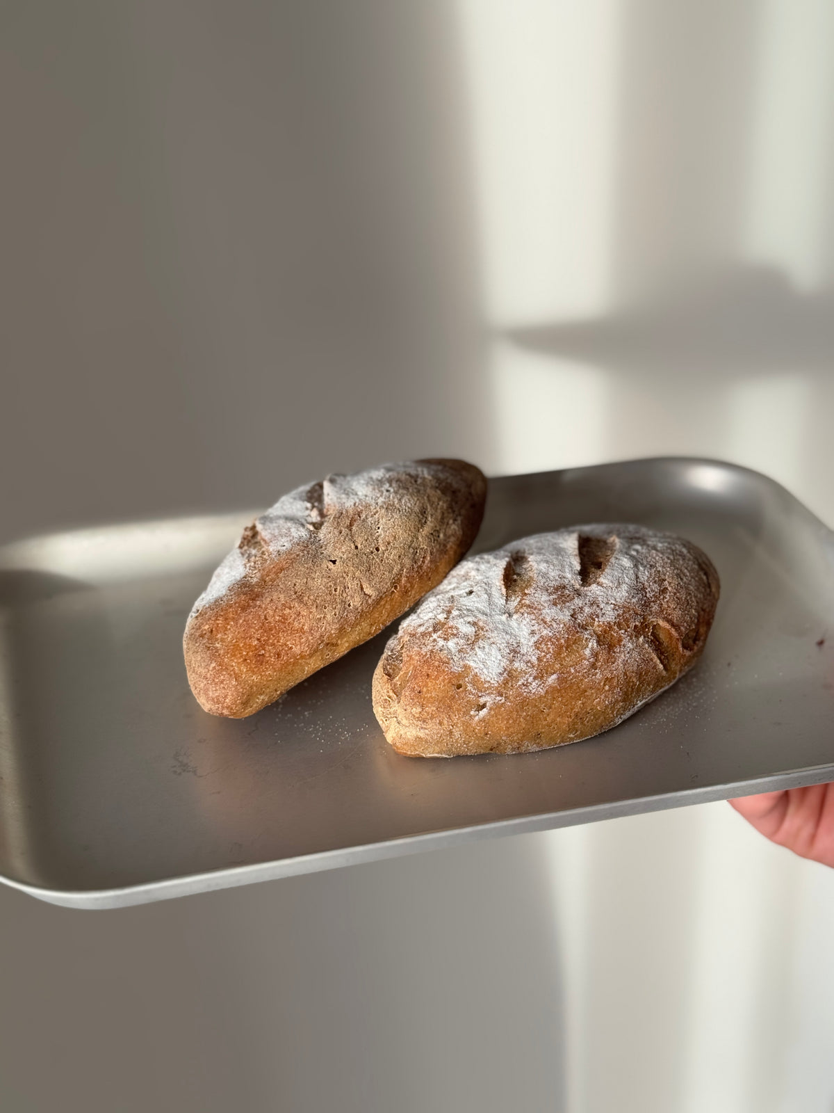 Two Gluten Free Wholemeal Baguettes dusted with Rice Flour
